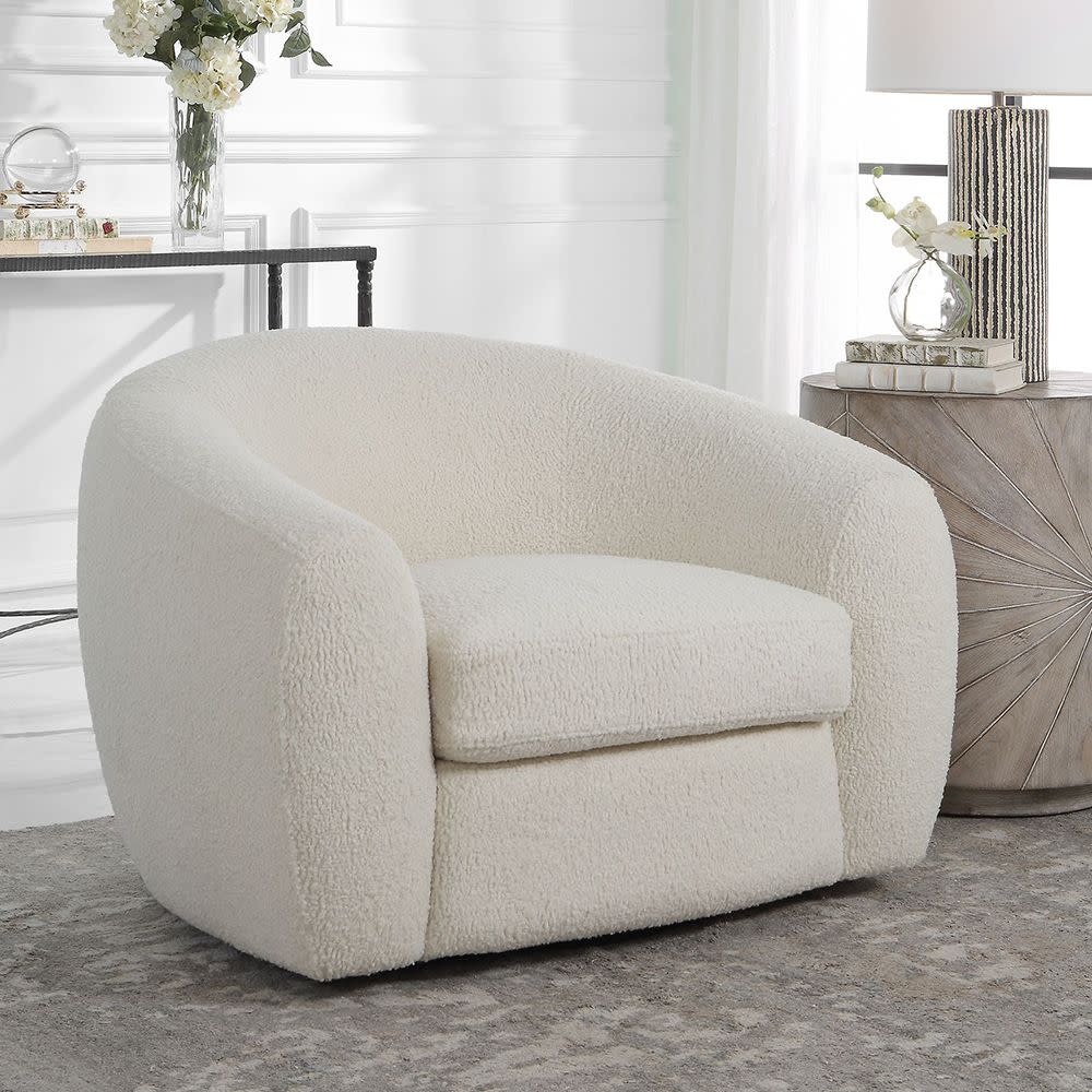 <p><a href="https://go.redirectingat.com?id=74968X1596630&url=https%3A%2F%2Fwww.potterybarn.com%2Fproducts%2Feveline-upholstered-swivel-chair-mp%2F&sref=https%3A%2F%2Fwww.elle.com%2Ffashion%2Fshopping%2Fg60387036%2Fbest-shearling-chairs%2F" rel="nofollow noopener" target="_blank" data-ylk="slk:Shop Now;elm:context_link;itc:0;sec:content-canvas" class="link rapid-noclick-resp">Shop Now</a></p><p>Eveline Upholstered Swivel Armchair</p><p>potterybarn.com</p><p>$1599.00</p>