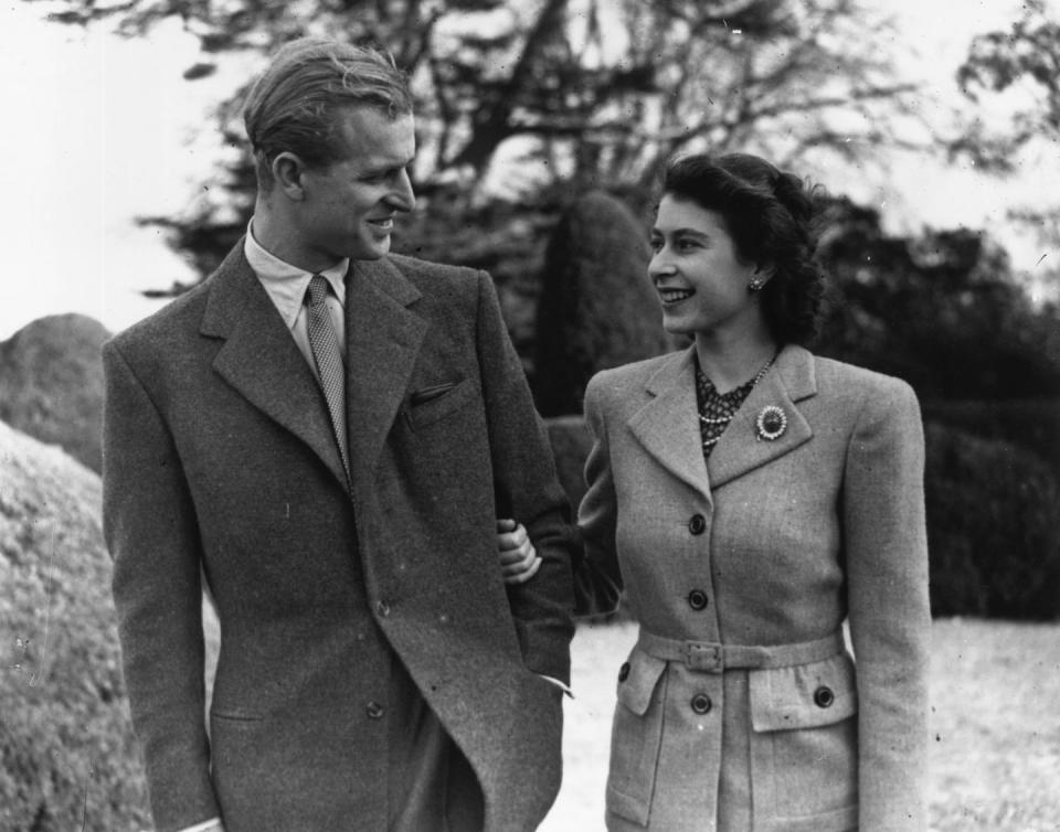 <p>Princess Elizabeth and Prince Philip, Duke of Edinburgh enjoy a walk during their honeymoon at Broadlands in Romsey, Hampshire in November 1947.</p>
