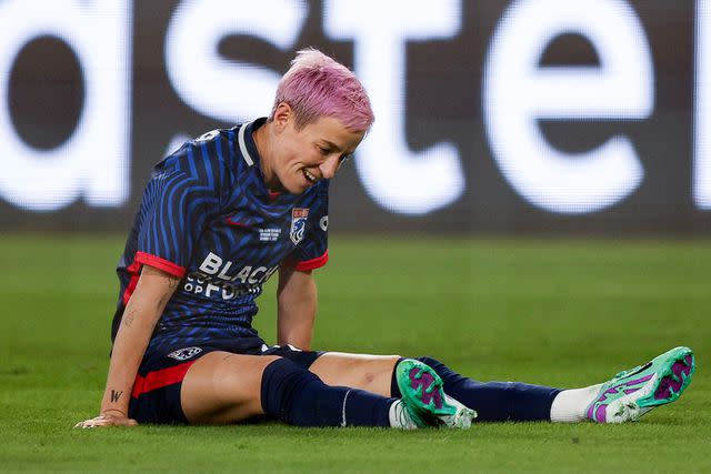 <p>Meg Oliphant/Getty </p> Megan Rapinoe is injured in the first half of NWSL Championship game