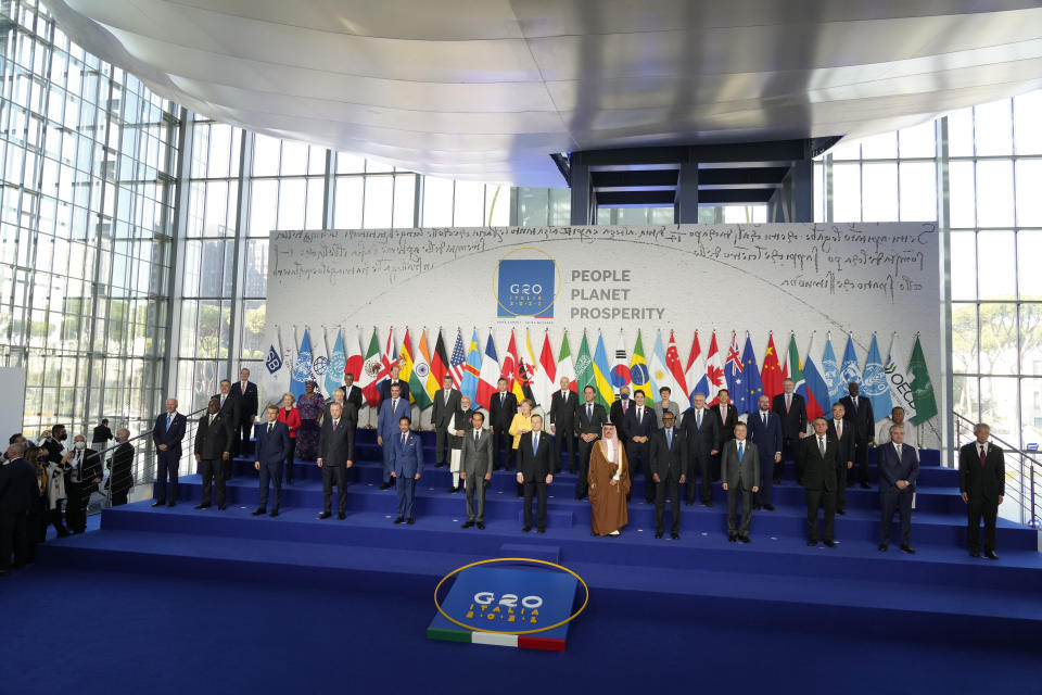 World leaders pose for a group photo at the La Nuvola conference center for the G20 summit in Rome, Saturday, Oct. 30, 2021. The two-day Group of 20 summit is the first in-person gathering of leaders of the world's biggest economies since the COVID-19 pandemic started. (AP Photo/Gregorio Borgia)