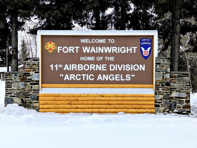 FILE - This photo provided by Fort Wainwright Public Affairs Office shows a recently installed new sign at the main entry point to U.S. Army Garrison Alaska Fort Wainwright on April 5, 2023, in Fairbanks, Alaska. The U.S. Army says three soldiers have been killed and another has been injured after two helicopters collided and crashed in Alaska while returning from a training flight, Thursday, April 27, 2023. The helicopters were from the 1st Attack Battalion, 25th Aviation Regiment at Fort Wainwright, based near Fairbanks. (Eve Baker/Fort Wainwright Public Affairs Office, File)