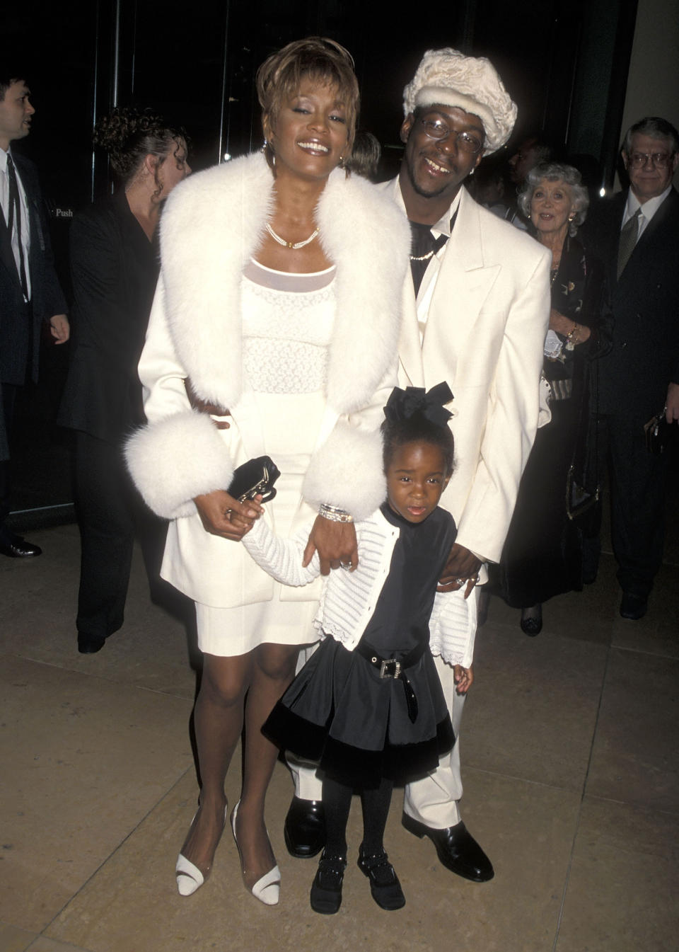 Singer Whitney Houston, singer Bobby Brown and daughter Bobbi Kristina Brown attend the Fourth Annual International Achievement in Arts Awards on October 11, 1998 at Beverly Hilton Hotel in Beverly Hills, California. (Photo by Ron Galella, Ltd./Ron Galella Collection via Getty Images)