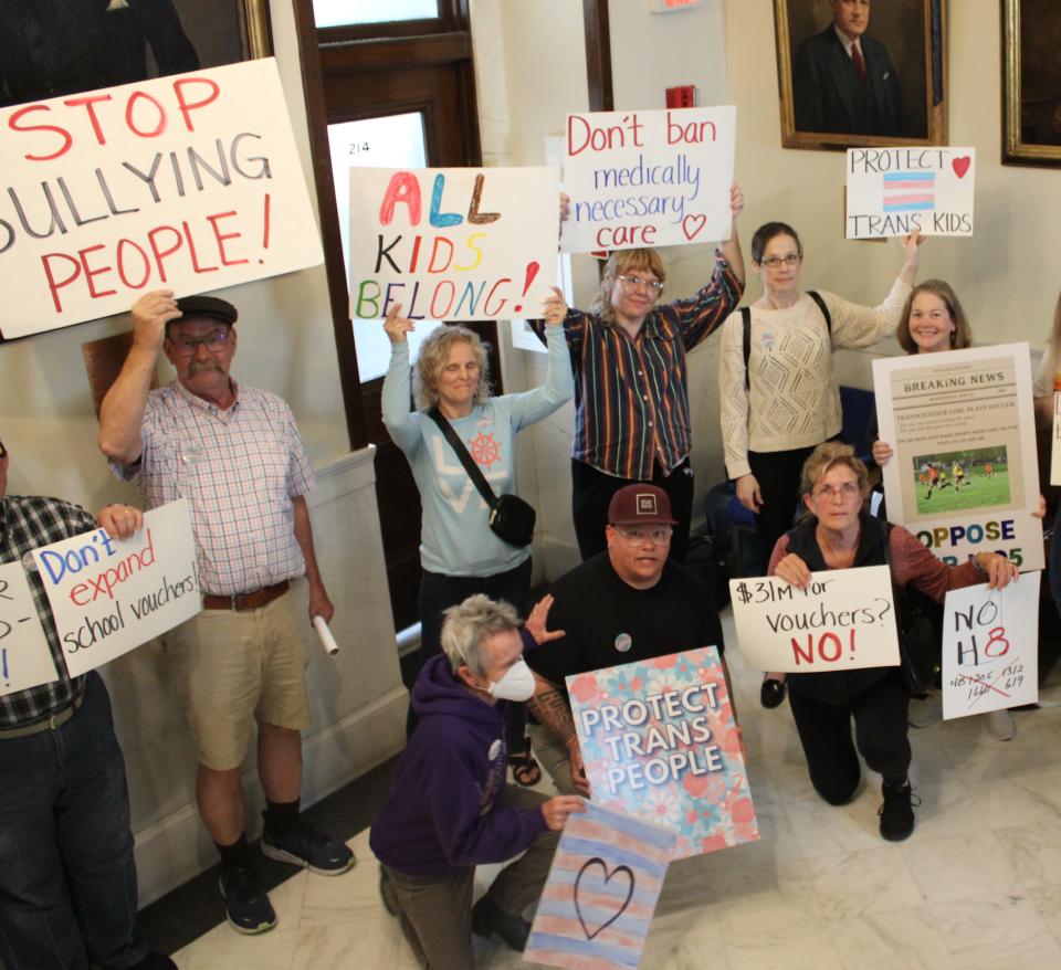 Trans rights supporters protested outside the New Hampshire Senate chamber on May 15.