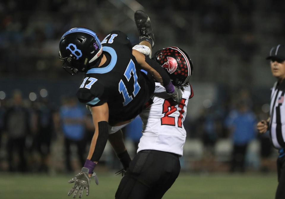 Buena's Matthew Homan is upended by Rio Mesa's Isaiah Bautista during the second quarter of their Channel League game on Friday, Sept. 30, 2022, at Buena High. Rio Mesa won 14-13.