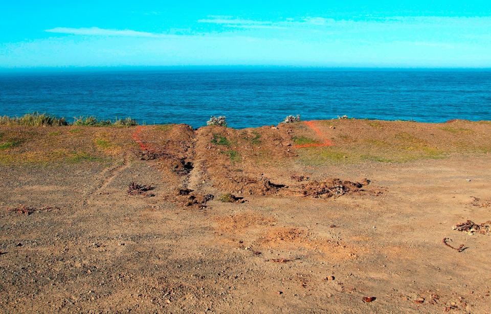 This March 29, 2018, file photo shows ruts cut into the clifftop where the SUV of Jennifer and Sarah Hart that went off the cliff was hauled up and over by a tow truck off the Pacific Coast Highway near Westport, Calif. A California Highway Patrol investigator testified Thursday, April 4, 2019 that Sarah Hart searched whether death by drowning was relatively painless hours before her wife drove an SUV off a cliff, killing them and six adopted children in waters below.