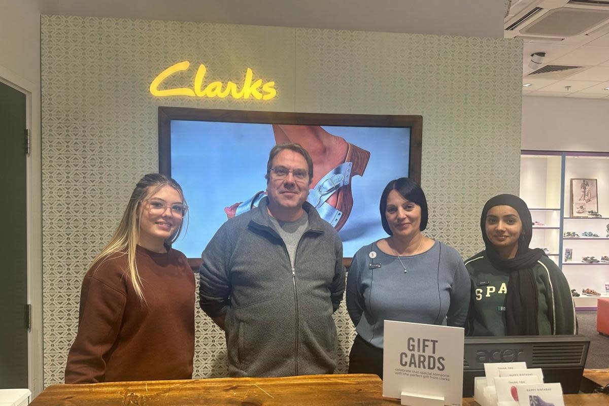 Richard Sharkey with his Clarks Bolton employees <i>(Image: NQ)</i>