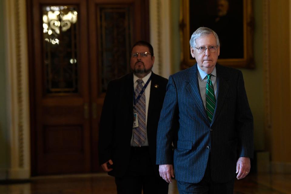 Senate Majority Leader Mitch McConnell of Ky., walks to his office on Capitol Hill in Washington, Thursday, March 19, 2020. (AP Photo/Susan Walsh) ORG XMIT: DCSW101