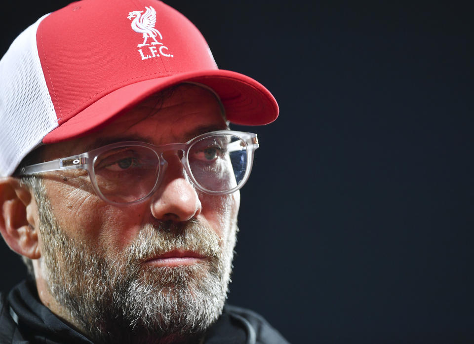 Liverpool's manager Jurgen Klopp is interviewed after their English Premier League soccer match between Liverpool and Arsenal at Anfield in Liverpool, England, Monday, Sept. 28, 2020. (Paul Ellis/Pool via AP)