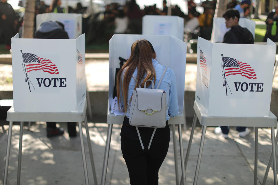 Desteny Martinez, 18, votes for the first time in Norwalk, Calif., on Oct. 24. (Photo: Lucy Nicholson/Reuters)