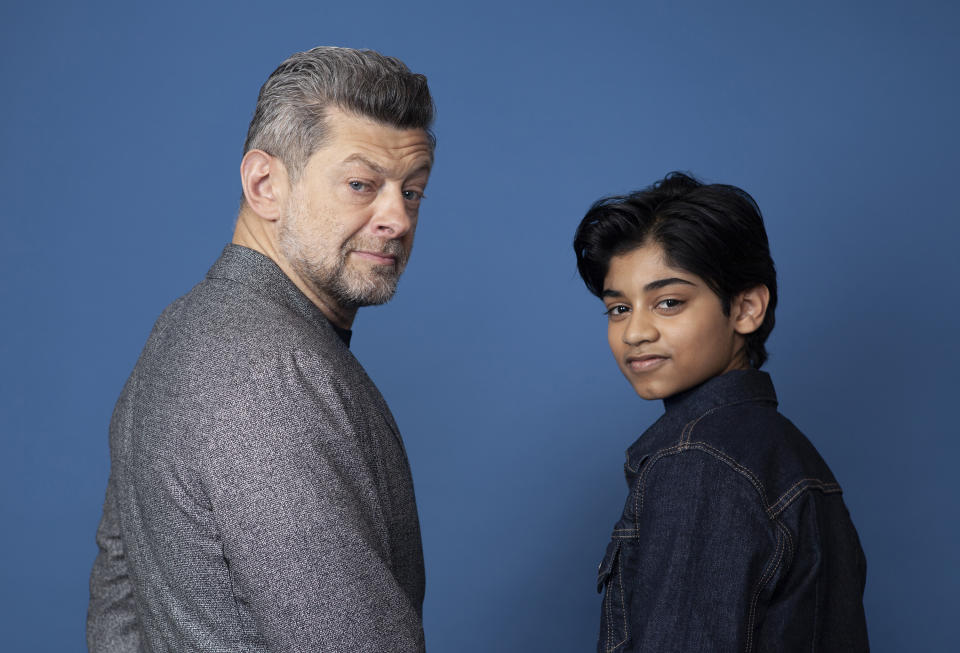 In this Nov. 28, 2018 photo, Andy Serkis, left, and Rohan Chand pose for a portrait at the Four Seasons Hotel in Los Angeles to promote their film "Mowgli: Legend of the Jungle," streaming on Nextflix on Friday, Dec. 7. (Photo by Rebecca Cabage/Invision/AP)