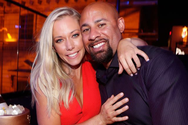 <p>Isaac Brekken/Getty </p> Kendra Wilkinson and Hank Baskett in June 2017.