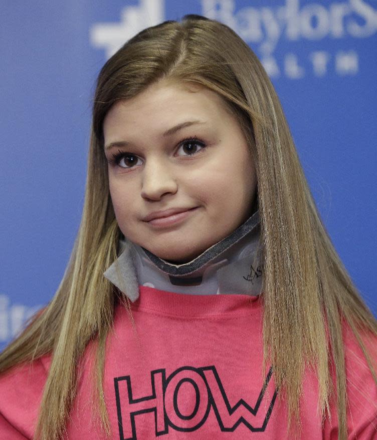 Makenzie Wethington listens to a question during a news conference at Baylor University Medical Center Thursday, Feb. 13, 2014, in Dallas. Wethington spoke for the first time publicly since she survived a fall of more than 3,000 feet in a Jan. 25, 2014 skydiving accident in Oklahoma. Her doctor has said she's walking with assistance and is expected to recover. Her injuries included damage to her liver and a broken pelvis, lumbar spine in her lower back, shoulder blade, several ribs and teeth. (AP Photo/LM Otero)