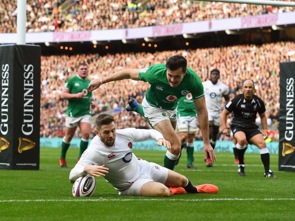 Elliot Daly touches down England's second try of the match: EPA