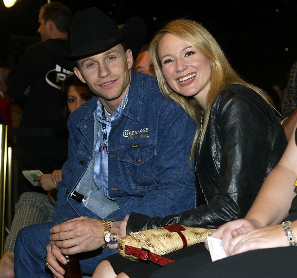Ty, in a cowboy hat and jeans, and Jewel sitting and smiling