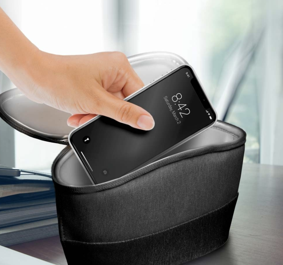 You can even tote this portable sanitizer like a purse. (Photo: Homedics)