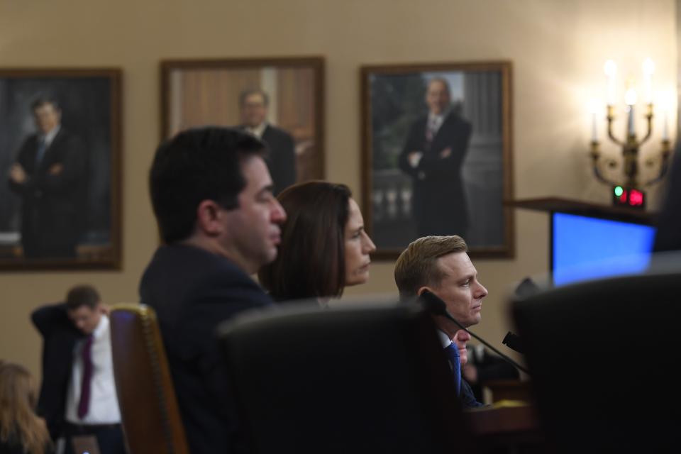 National Security Council official Fiona Hill and State department official David Holmes testify before the Permanent Select Committee on Intelligence on Nov. 21, 2019 in a public hearing in the impeachment inquiry into allegations President Donald Trump pressured Ukraine to investigate his political rivals.