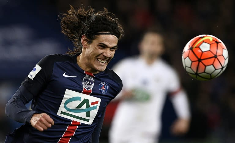 Paris Saint-Germain's forward Edinson Cavani runs for the ball during the French Cup round of sixteen football match between Paris Saint-Germain and Lyon on February 10, 2016, at the Parc des Princes stadium in Paris