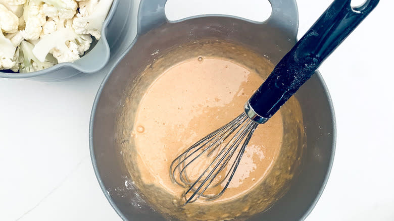 batter in bowl with whisk