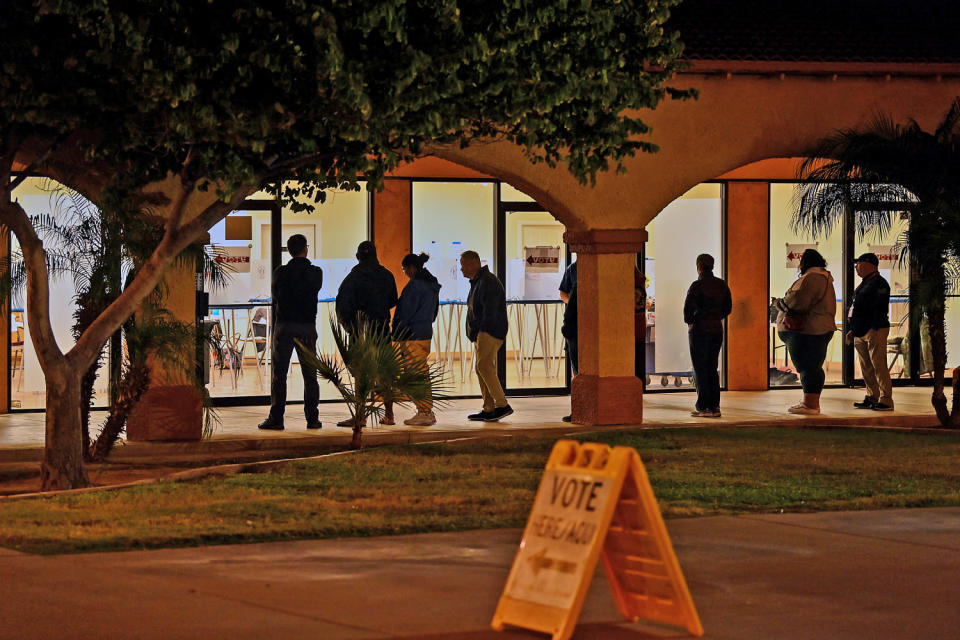 Voters wait in line on Nov. 8, 2022 in Guadalupe, Ariz. (Joshua Lott / The Washington Post via Getty Images file)