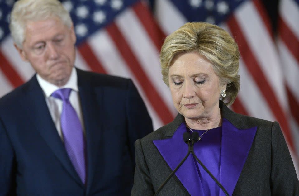 Bill and Hillary Clinton during her speech. Photo: AAP