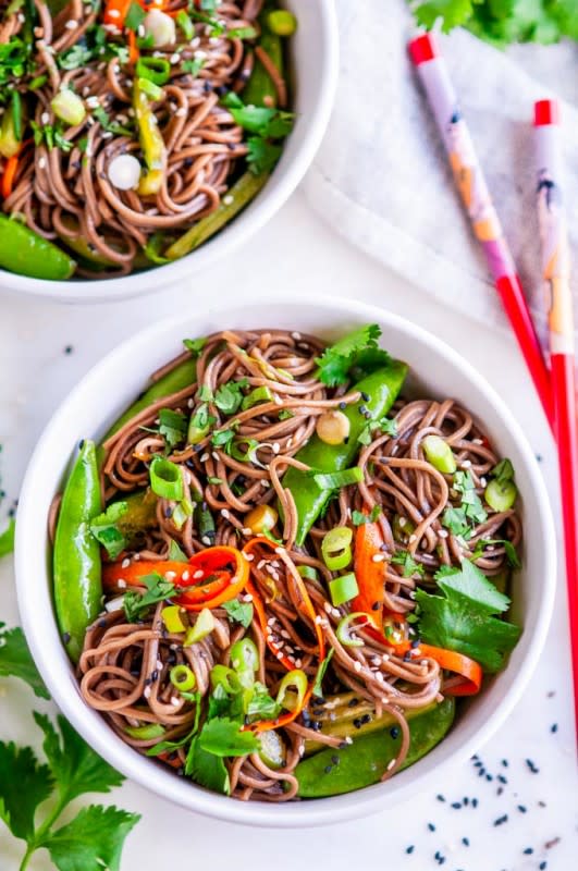 <p>A chilled soba noodle dish chock full of veggies and a flavorful soy sesame dressing.</p><p><strong>Get the recipe: <a href="https://www.aberdeenskitchen.com/2019/07/soba-noodle-salad-with-sesame-soy-dressing/" rel="nofollow noopener" target="_blank" data-ylk="slk:Soba Noodle Salad with Sesame Soy Dressing;elm:context_link;itc:0;sec:content-canvas" class="link "><em>Soba Noodle Salad with Sesame Soy Dressing</em></a></strong></p>