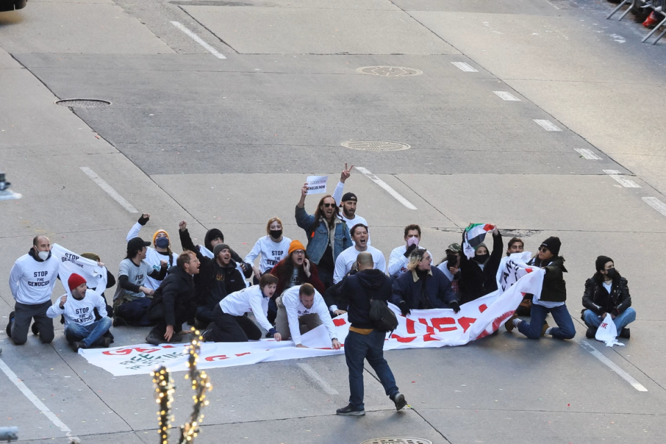 Pro-Palestine protestors at Macy’s Thanksgiving Day Parade (Brendan Mcdermid/Reuters)