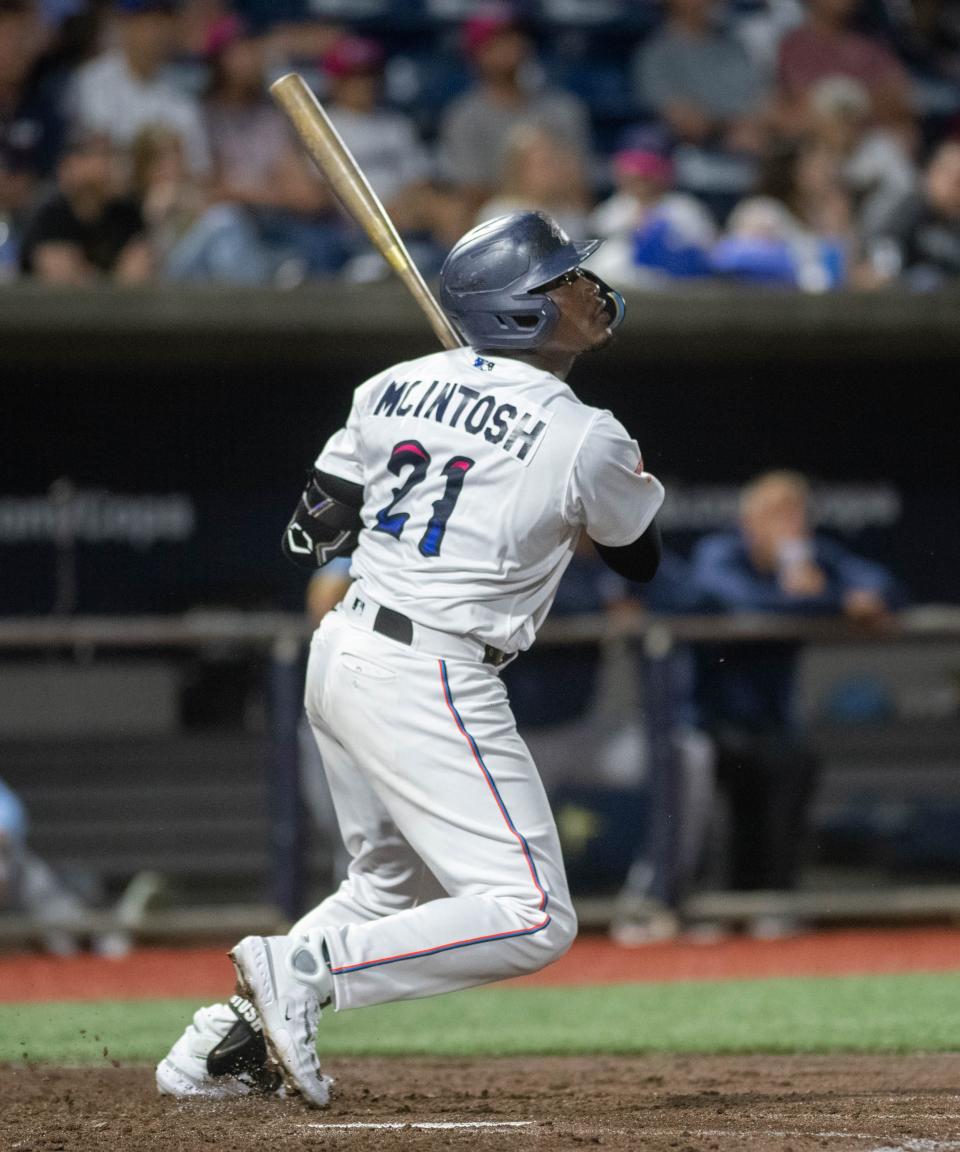 Paul McIntosh (21) puts the ball in play during the Montgomery Biscuits vs Pensacola Blue Wahoos baseball game on opening night at Blue Wahoos Stadium in Pensacola on Friday, April 7, 2023.