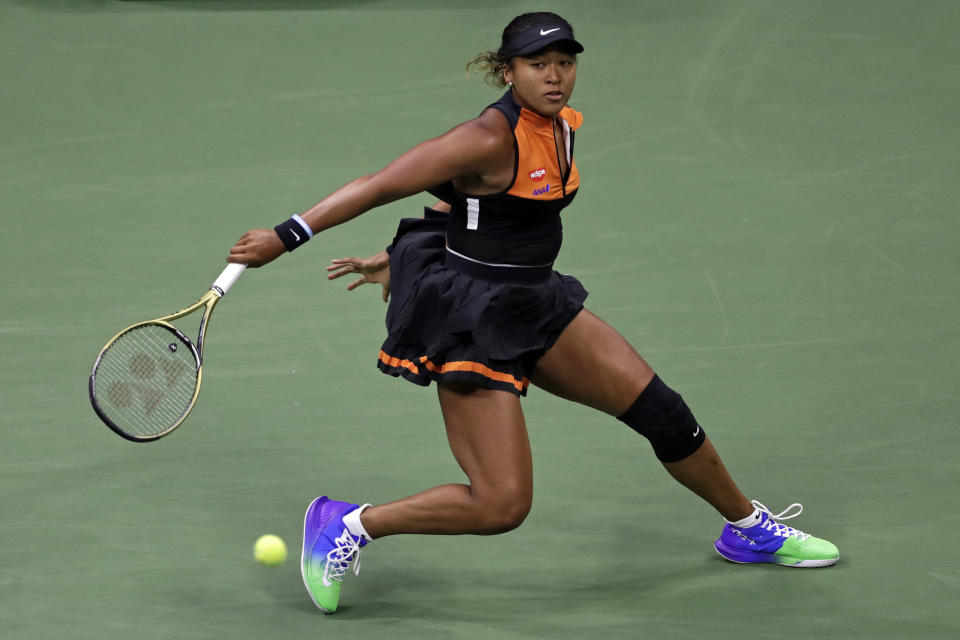Naomi Osaka, of Japan, returns a shot to Coco Gauff during the third round of the U.S. Open tennis tournament Saturday, Aug. 31, 2019, in New York. (AP Photo/Adam Hunger)