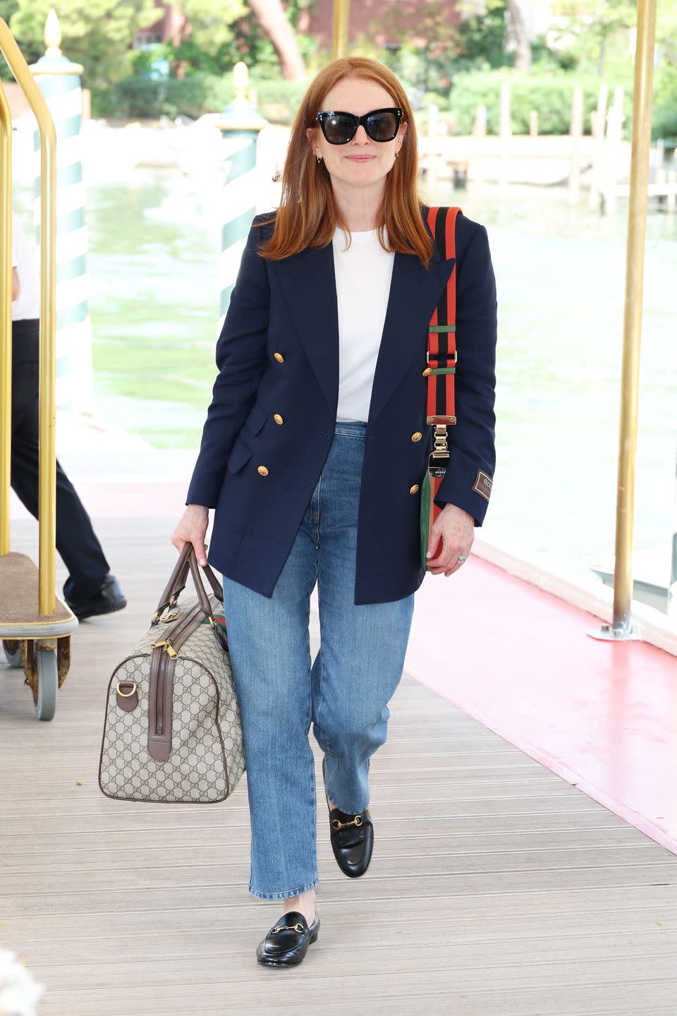 <p>Venice Film Festival jury president Julianne Moore was seen arriving in the Italian city wearing a casual, head-to-toe Gucci look.</p>