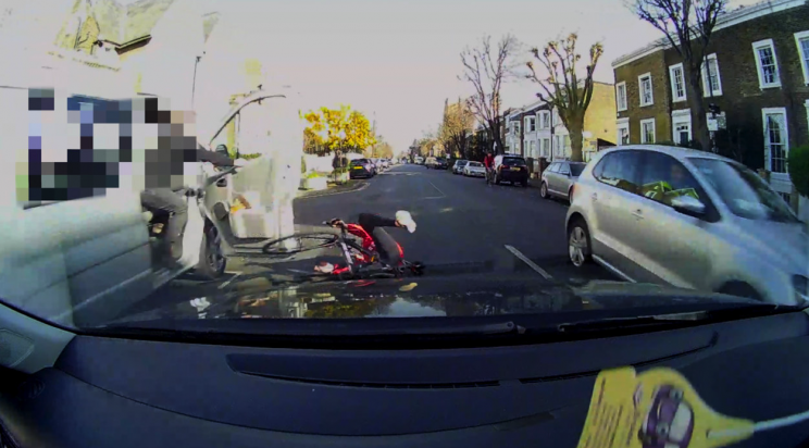 The driver of the Volkswagen Jetta almost collided with the cyclist (Picture: SWNS)