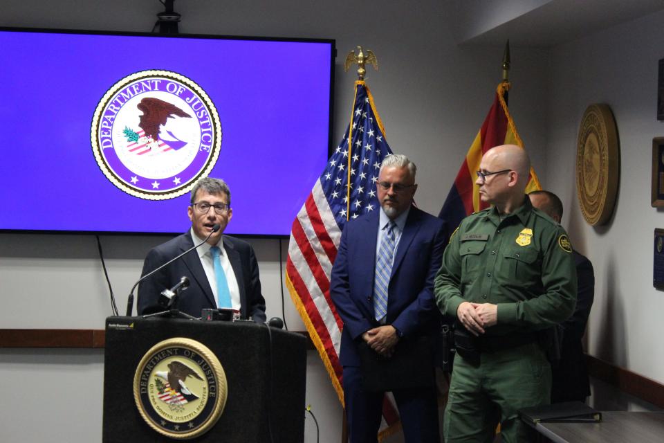 Gary Restaino, the U.S. attorney for the District of Arizona, speaks during a news conference about the extradition of a Honduran woman facing human smuggling charges. Leo Lamas, deputy special agent in charge for Homeland Security Investigations in Tucson; John Modlin, chief patrol agent of the U.S. Border Patrol's Tucson Sector; and Acting U.S. Marshal Van Bayless are also pictured.