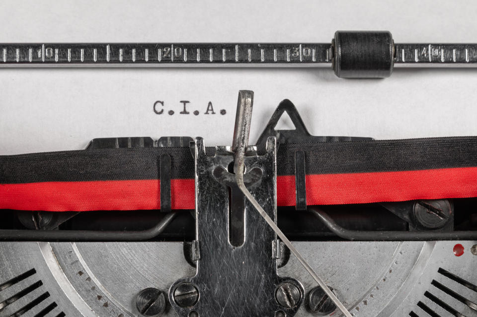 Typewriter with paper showing text "C.i.A." as if in the process of typing