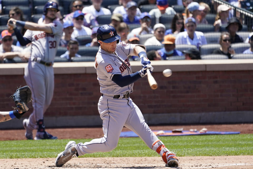 Houston Astros' Alex Bregman hits a single during the fourth inning of a baseball game against the New York Mets, Wednesday, June 29, 2022, in New York. (AP Photo/Mary Altaffer)