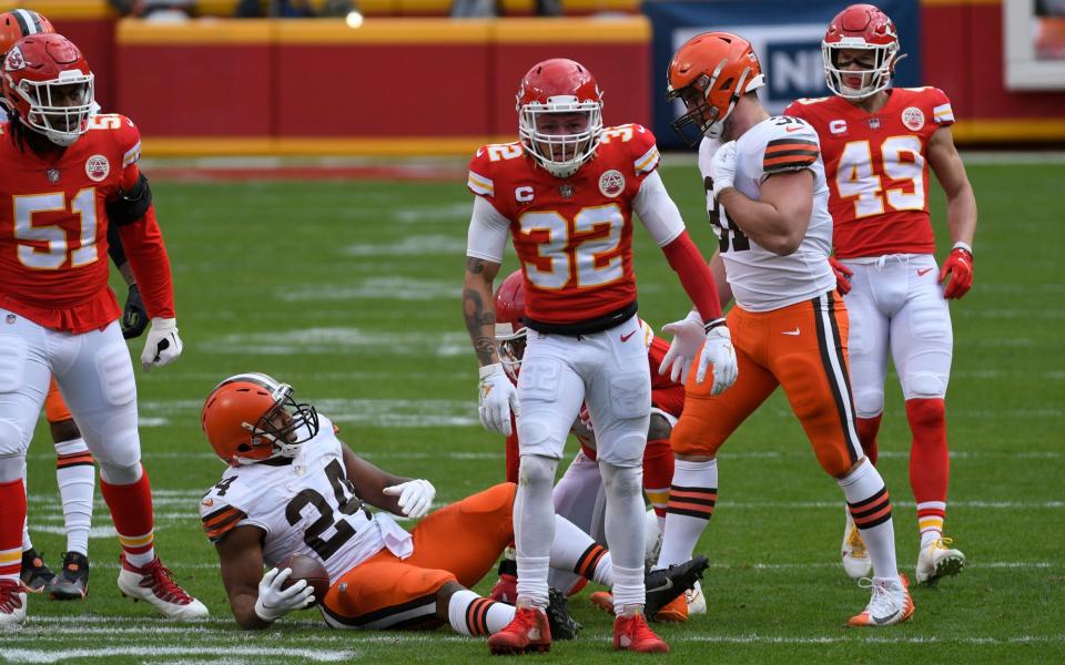 Kansas City Chiefs safety Tyrann Mathieu (32) celebrates after tackling Cleveland Browns running back Nick Chubb (24) during the first half of an NFL divisional round football game, Sunday, Jan. 17, 2021, in Kansas City.  - AP