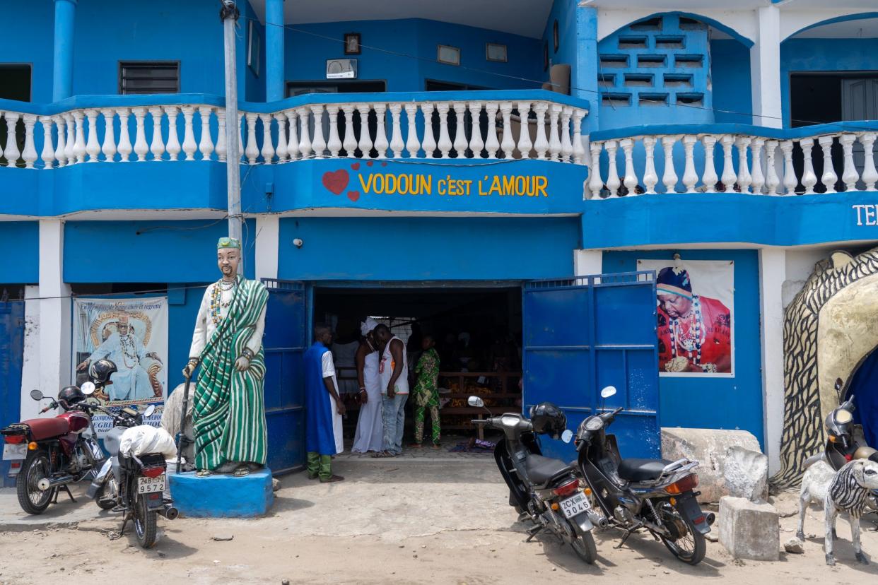 The Temple of Thron is located in Cotonou's Vedoko district. The slogan above the door reads 'Voodoo is love'