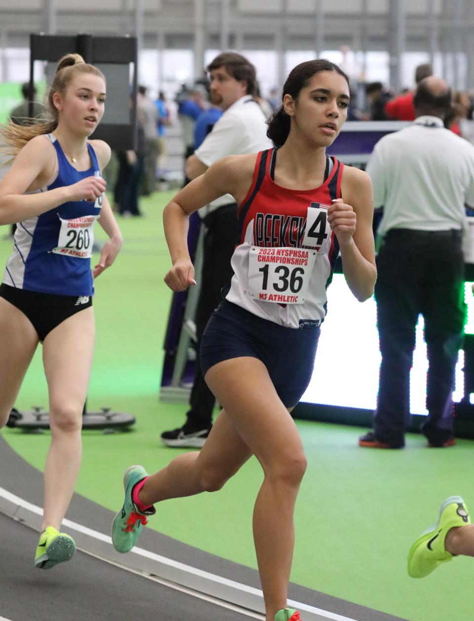 Juliette Salazar from Peekskill competes in the girls 1000 meter run during the New York State Indoor Track and Field Championships, at the Ocean Breeze Athletic Complex on Staten Island, March 4, 2023. 
