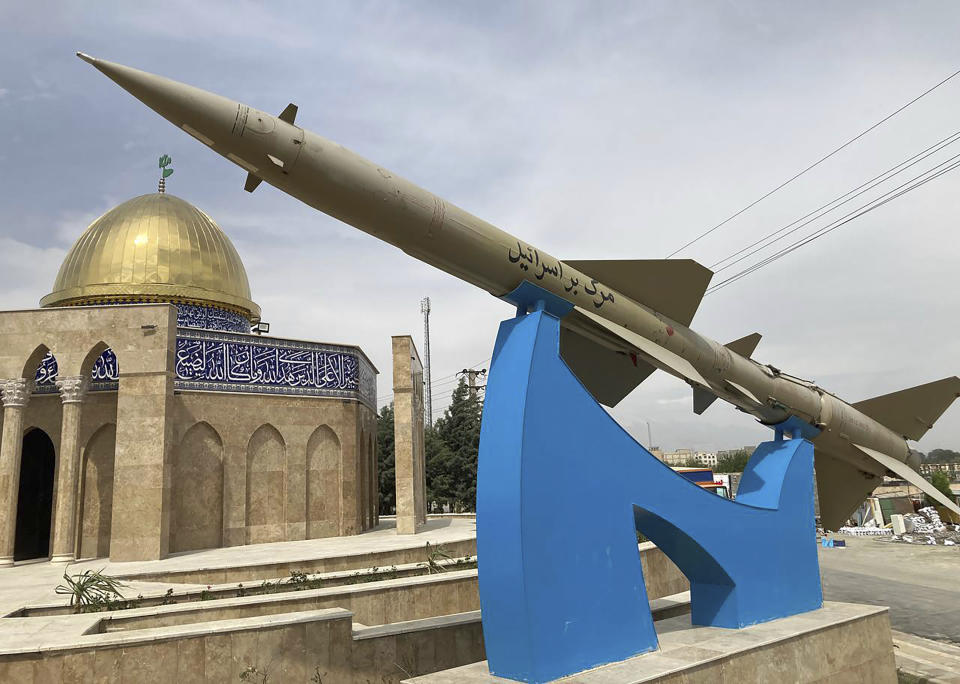 A missile is on display with a sign on it reading in Farsi: "Death to Israel" in front of a mosque in the shape of Dome of the Rock of Jerusalem at an entrance of the Quds town west of the capital Tehran, Iran, Sunday, April 21, 2024. Iran's supreme leader Ayatollah Khamenei on Sunday dismissed any discussion of whether Tehran's unprecedented drone-and-missile attack on Israel hit anything there, a tacit acknowledgment that despite launching a massive assault, few projectiles actually made through to their targets. (AP Photo/Vahid Salemi)