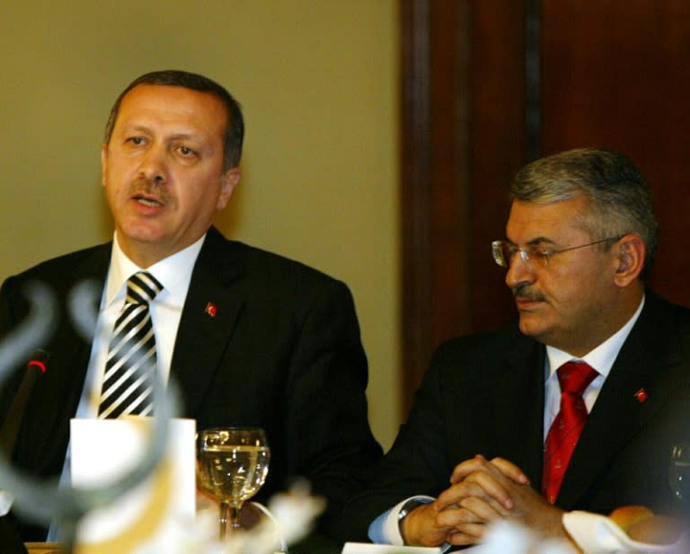 Turkish leader Recep Tayyip Erdogan (left) and Binali Yildirim attend a 2006 reception at the Dolmabahce Palace in Istanbul