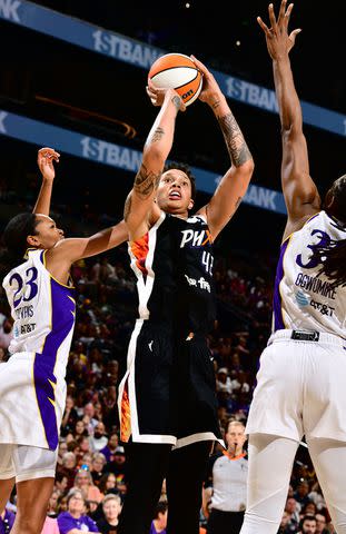 <p>Barry Gossage/NBAE via Getty</p> Brittney Griner of the Phoenix Mercury shoots the ball during the game against the Los Angeles Sparks on July 9, 2023 at Footprint Center in Phoenix, Arizona.