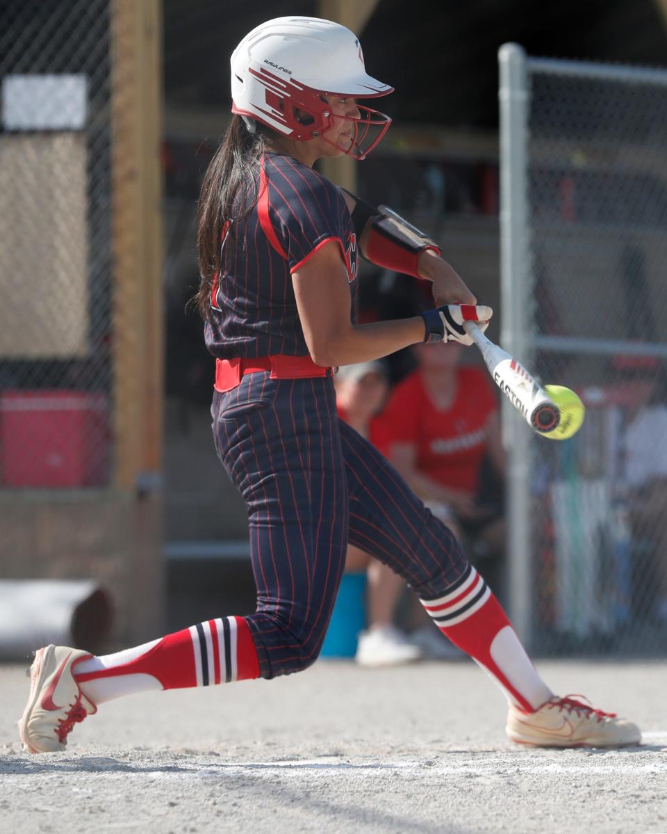 Tri-County Cavaliers Bella Dominguez (7) hits the ball during the IHSAA softball game against the West Lafayette Red Devils, Wednesday, May 10, 2023, at West Lafayette High School in West Lafayette, Ind. West Lafayette won 15-7.