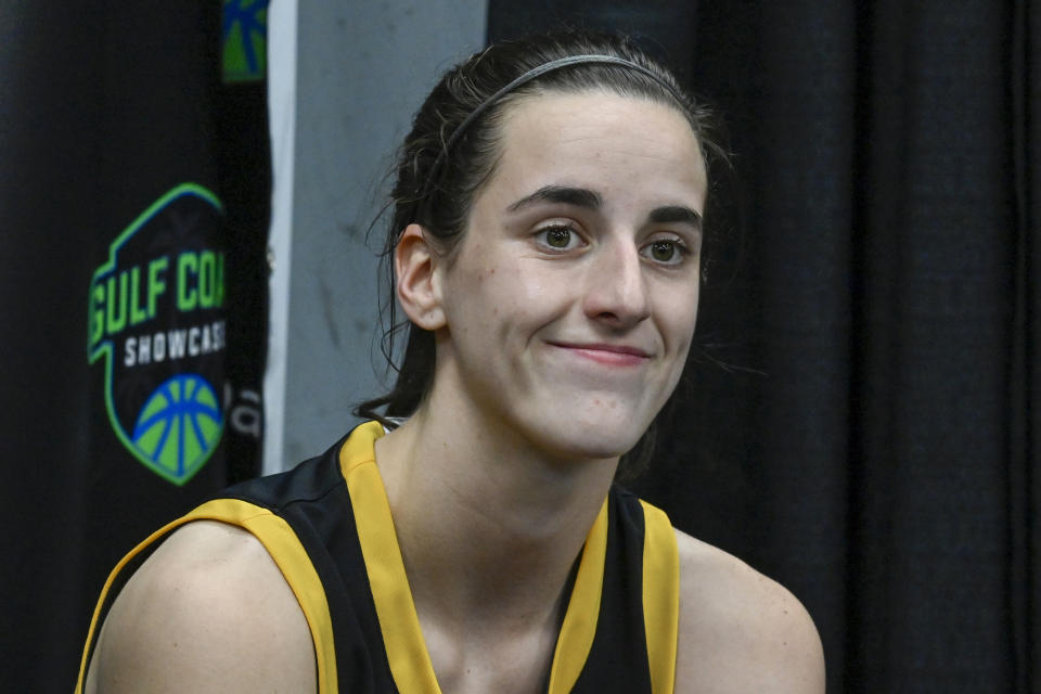 Iowa guard Caitlin Clark talks to reporters after the team's win over Florida Gulf Coast in an NCAA college basketball game in the Gulf Coast Showcase, Saturday, Nov. 25, 2023, in Estero, Fla. (AP Photo/Steve Nesius)