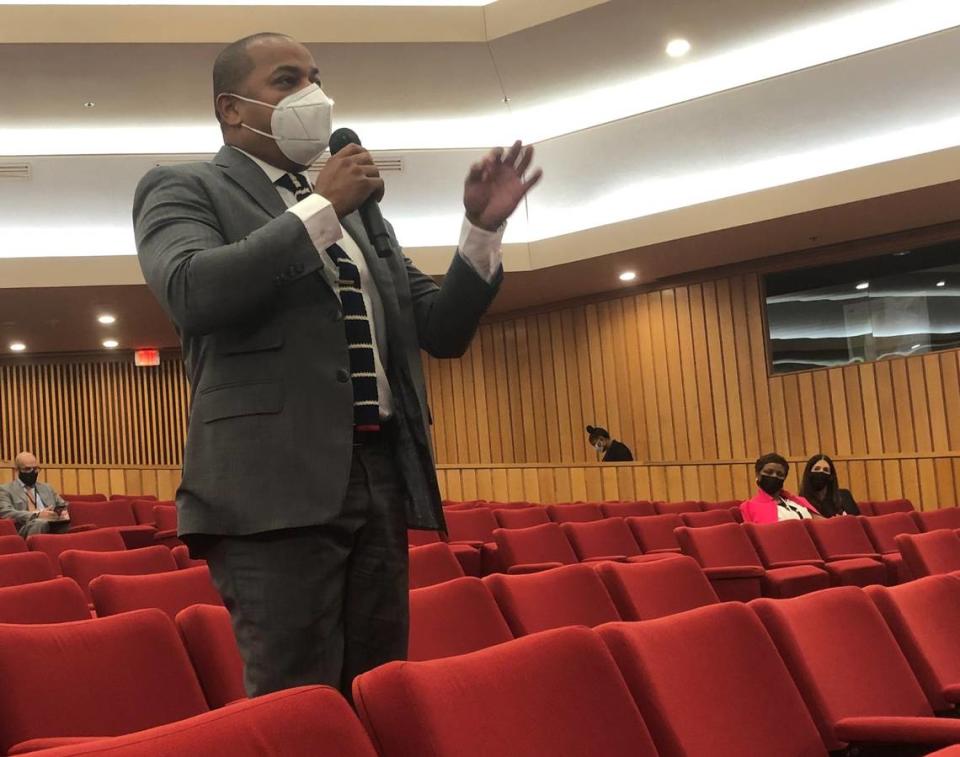 Miami-Dade Commissioner Keon Hardemon speaks from the second row of the commission chambers on Tuesday, Oct. 19, 2021, to demonstrate how far away citizens would need to stand back from police under state legislation the board was asked to endorse. The resolution endorsing the House Bill 11 failed.