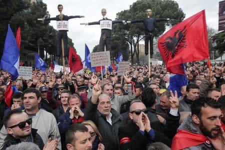 Supporters of the opposition Democratic Party take part in an anti-government protest in front of the office of Albanian Prime Minister Edi Rama in Tirana, Albania February 18, 2017. REUTERS/Florion Goga