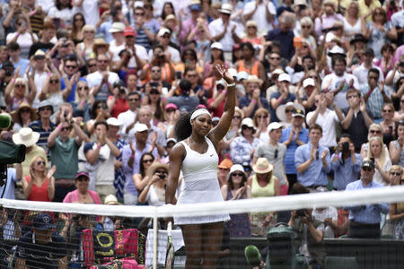 Serena Williams of the U.S.A. celebrates after winning her match against Venus Williams of the U.S.A. at the Wimbledon Tennis Championships in London, July 6, 2015. REUTERS/Toby Melville