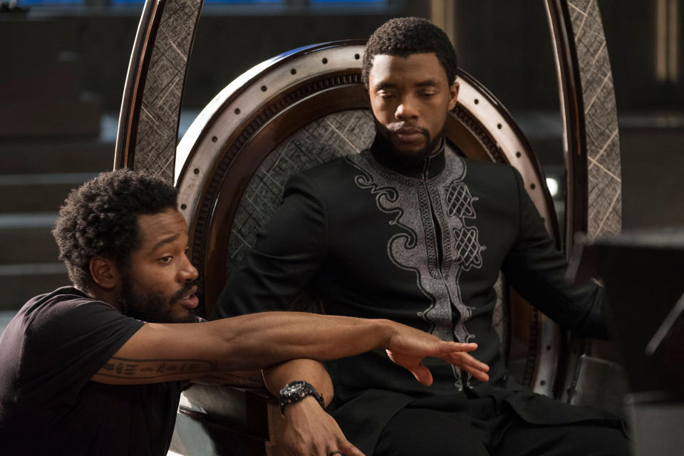 Coogler, who used T'Challa's conflict with Killmonger to make the character more relatable, with Boseman on set<span class="copyright">Marvel/Disney—Kobal/Shutterstock</span>