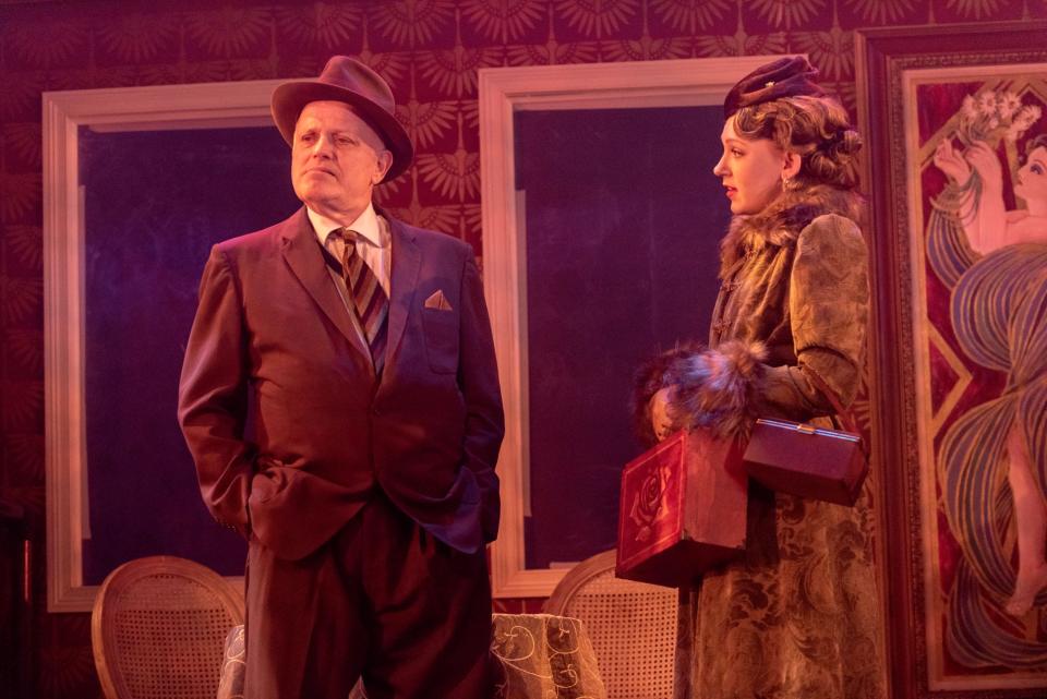 Steve Brown and Lauren Koleszar perform as Samuel Ratchett and Countess Andrenyi in "Murder on the Orient Express" at Weathervane Playhouse.