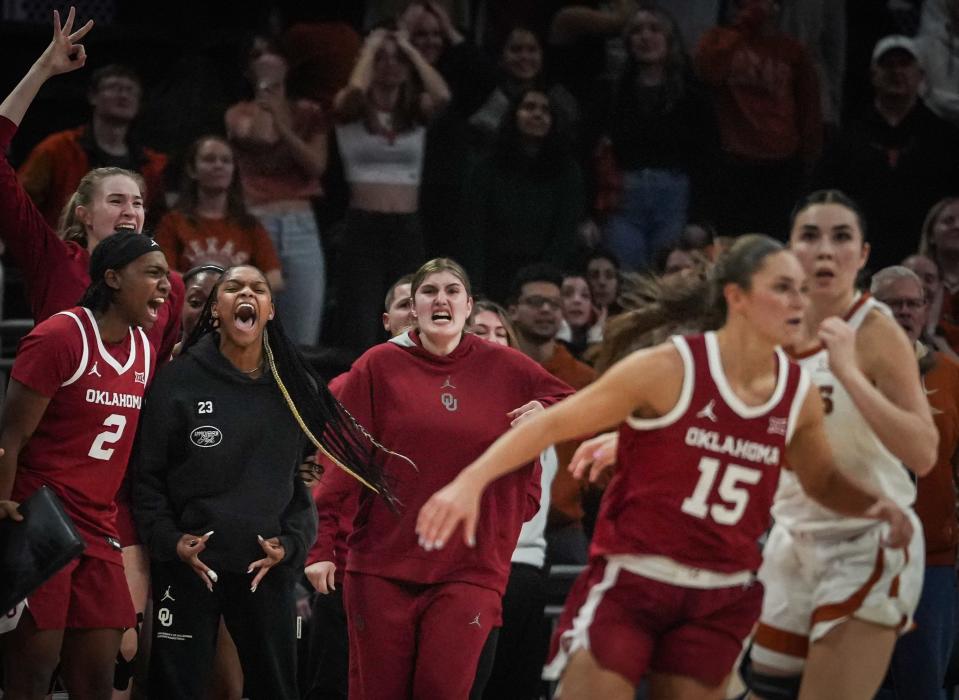 The Oklahoma bench celebrates a three-point shot late in the second half of the Longhorns' game against the Oklahoma Sooners at the Moody Center in Austin, Texas, Jan 24, 2024. The Sooners won the game 91-87.