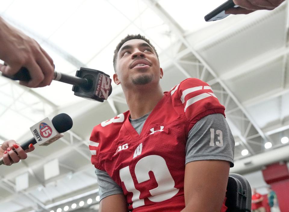 Wisconsin Badgers wide receiver Chimere Dike answers questions during Wisconsin Badgers football media day at Camp Randall Stadium in Madison on Tuesday, Aug. 1, 2023.