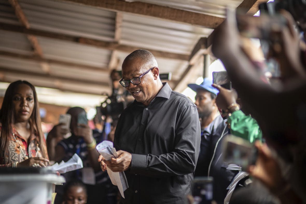 Nigeria’s Labour Party’s candidate Peter Obi casts his vote during the presidential elections in Agulu, Nigeria, Saturday, Feb. 25, 2023. Voters in Africa’s most populous nation are heading to the polls Saturday to choose a new president, following the second and final term of incumbent Muhammadu Buhari. (AP Photo/Mosa’ab Elshamy)