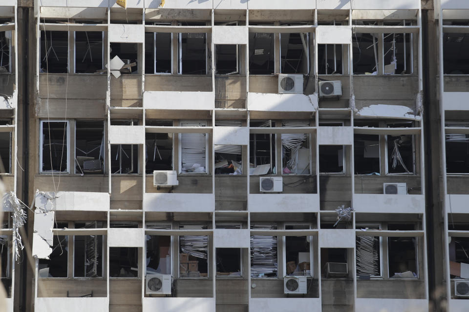 A damage is seen after a massive explosion in Beirut, Lebanon, Wednesday, Aug. 5, 2020. The explosion flattened much of a port and damaged buildings across Beirut, sending a giant mushroom cloud into the sky. In addition to those who died, more than 3,000 other people were injured, with bodies buried in the rubble, officials said.(AP Photo/Hassan Ammar)